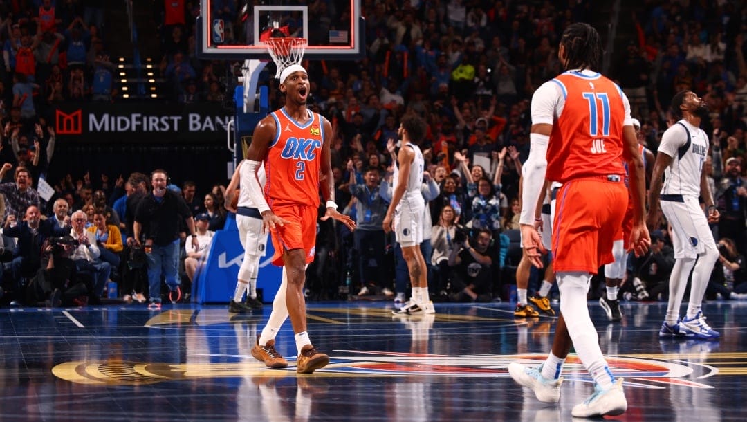 Shai Gilgeous-Alexander #2 of the Oklahoma City Thunder celebrates during the game against the Dallas Mavericks during the Emirates NBA Cup Quarterfinals on December 10, 2024 at Paycom Center in Oklahoma City, Oklahoma.