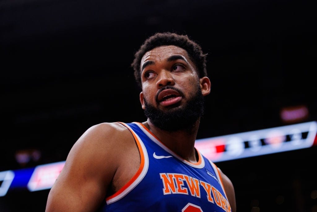 TORONTO, CANADA - DECEMBER 9: Karl-Anthony Towns #32 of the New York Knicks reacts during first half of their NBA game against the Toronto Raptors at Scotiabank Arena on December 9, 2024 in Toronto, Canada. NOTE TO USER: User expressly acknowledges and agrees that, by downloading and or using this photograph, User is consenting to the terms and conditions of the Getty Images License Agreement.