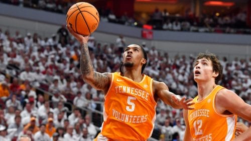 Tennessee guard Zakai Zeigler (5) goes in for a layup during the first half of an NCAA college basketball game against Louisville in Louisville, Ky., Saturday, Nov. 9, 2024.