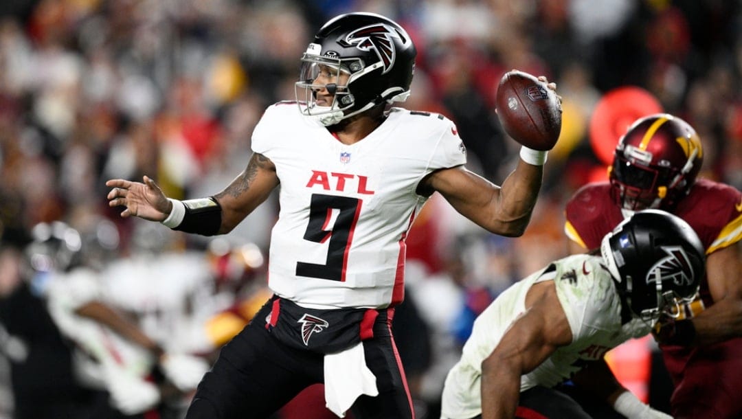 Atlanta Falcons quarterback Michael Penix Jr. (9) passes during the second half of an NFL football game against the Washington Commanders, Sunday, Dec. 29, 2024, in Landover, Md.