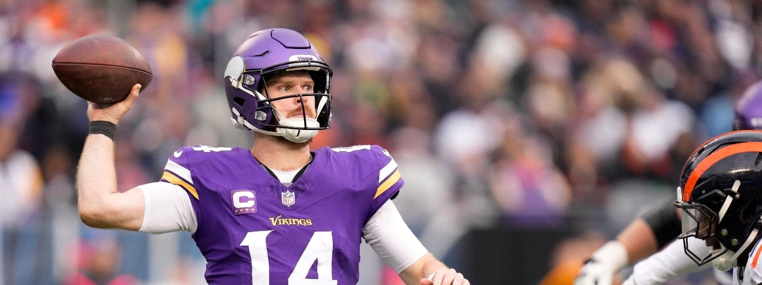 Minnesota Vikings quarterback Sam Darnold (14) throws a pass during the second half of an NFL football game against the Chicago Bears, Sunday, Nov. 24, 2024, in Chicago.