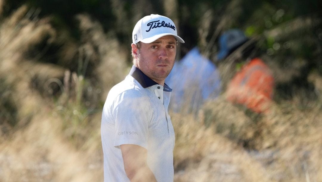 Justin Thomas, of the United States, watches the 10th fairway during the second round of the Hero World Challenge PGA Tour at the Albany Golf Club, in New Providence, Bahamas, Friday, Dec. 6, 2024.