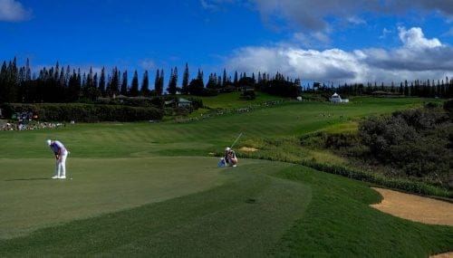 Scottie Scheffler putts on the 18th green during the final round of The Sentry golf event, Sunday, Jan. 7, 2024, at Kapalua Plantation Course in Kapalua, Hawaii. (AP Photo/Matt York)