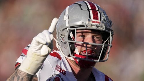 Ohio State defensive end Jack Sawyer (33) celebrates blocking a pass against Oregon during the first half in the quarterfinals of the Rose Bowl College Football Playoff, Wednesday, Jan. 1, 2025, in Pasadena, Calif.