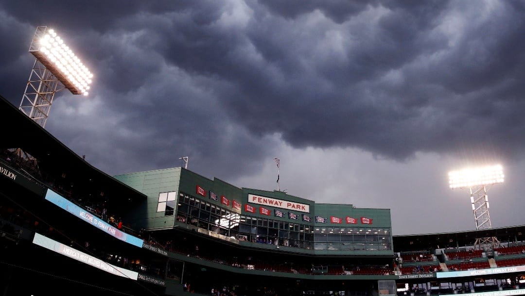 Storm clouds roll over Fenway Park, prior to heavy rain and lightning, prior to baseball game between the Boston Red Sox and Minnesota Twins in Boston, Tuesday, June 27, 2017. The start of the game was delayed due to weather.