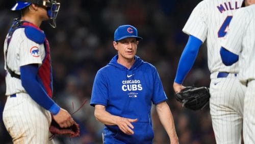 Chicago Cubs manager Craig Counsell takes the mound for a pitching change during the seventh inning of a baseball game against the Atlanta Braves, Tuesday, May 21, 2024, in Chicago.