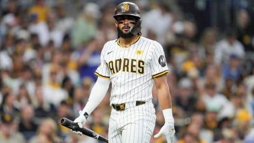 San Diego Padres' Fernando Tatis Jr. walks back to the dugout after striking out during the first inning in Game 4 of a baseball NL Division Series against the Los Angeles Dodgers, Wednesday, Oct. 9, 2024, in San Diego.