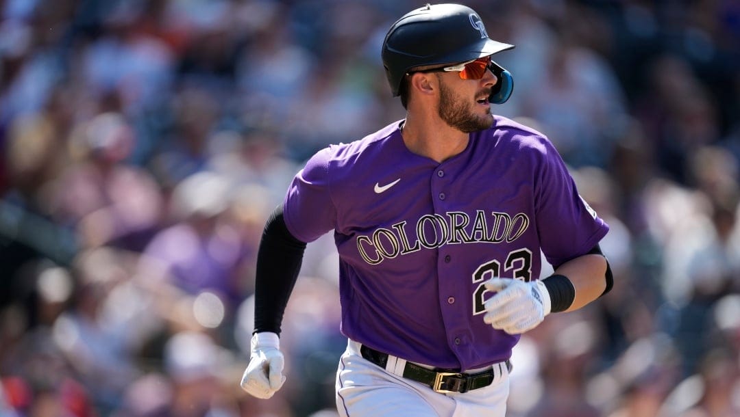 Colorado Rockies left fielder Kris Bryant (23) in the sixth inning of a baseball game Wednesday, July 27, 2022, in Denver.