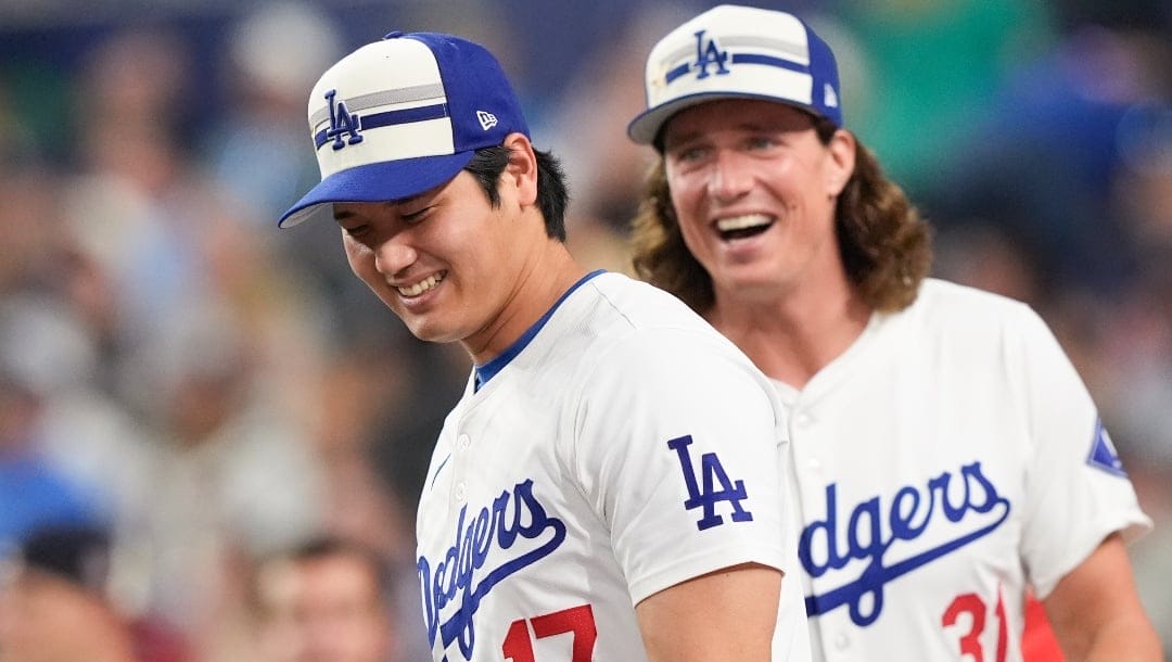 National League's Shohei Ohtani, left, and Tyler Glasnow, of the Los Angeles Dodgers, smile during the MLB baseball All-Star Home Run Derby, Monday, July 15, 2024, in Arlington, Texas.