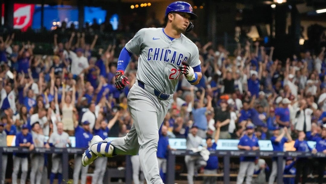 Chicago Cubs' Seiya Suzuki hits a home run during the fourth inning of a baseball game against the Milwaukee Brewers Friday, June 28, 2024, in Milwaukee.