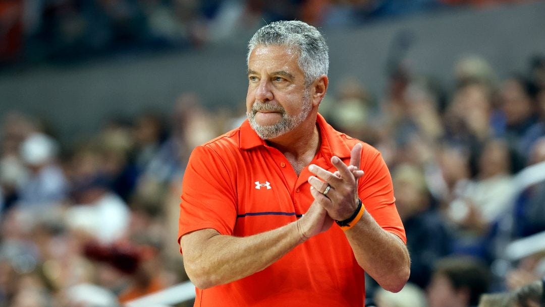 Auburn head coach Bruce Pearl reacts to a play during the first half of an NCAA college basketball game against Monmouth, Monday, Dec. 30, 2024, in Auburn, Ala.