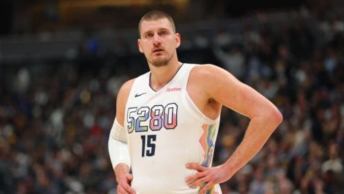 DENVER, COLORADO - JANUARY 21: Nikola Jokic #15 of the Denver Nuggets looks on against the Philadelphia 76ers during the third quarter at Ball Arena on January 21, 2025 in Denver, Colorado. NOTE TO USER: User expressly acknowledges and agrees that, by downloading and or using this photograph, User is consenting to the terms and conditions of the Getty Images License Agreement.