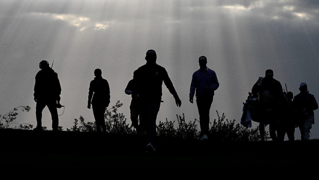 Andrew Novak walks on the 17th hole on the South Course at Torrey Pines during the final round of the Farmers Insurance Open golf tournament Saturday, Jan. 25, 2025, in San Diego.