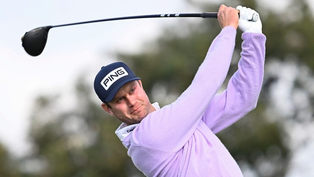 Harris English hits his tee shot on the second hole on the South Course at Torrey Pines during the final round of the Farmers Insurance Open golf tournament Saturday, Jan. 25, 2025, in San Diego.