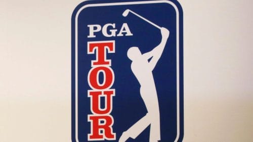 The PGA Tour logo is shown during a press conference in Tokyo, Tuesday, Nov. 20, 2018. The PGA Tour is getting a $3 billion investment from Strategic Sports Group in a deal that would give players access to more than $1.5 billion as equity owners in the new PGA Tour Enterprises. The Associated Press obtained a copy of the announcement expected to be released Wednesday morning, Jan. 31, 2024. PGA Tour Commissioner Jay Monahan was holding a conference call with players about the deal that was finalized Tuesday night.