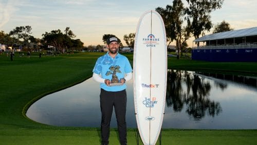 Matthieu Pavon holds the trophy after winning the Farmers Insurance Open golf tournament, Saturday, Jan. 27, 2024, in San Diego.