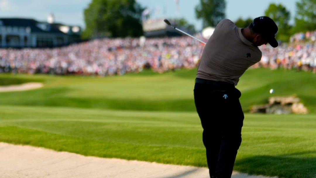 FILE - Xander Schauffele hits from the rough on the 18th hole during the final round of the PGA Championship golf tournament at the Valhalla Golf Club, Sunday, May 19, 2024, in Louisville, Ky. (AP Photo/Matt York, File