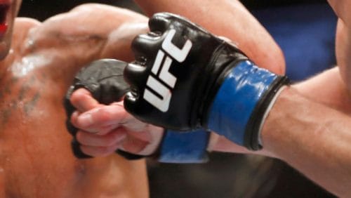 FILE - Thiago Alves, left, and Seth Baczynski fight in a mixed martial arts event on Saturday, April 19, 2014, at UFC Fight Night.