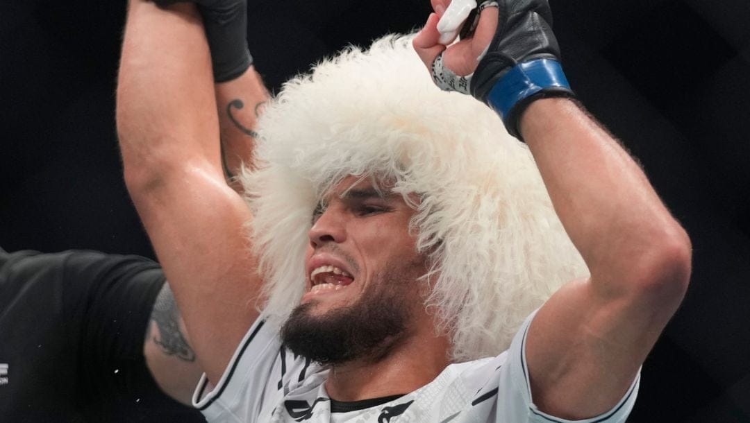 Russia's Umar Nurmagomedov, reacts after defeating Cory Sandhagen, of the United States ,in a bantamweight bout at UFC Fight Night.