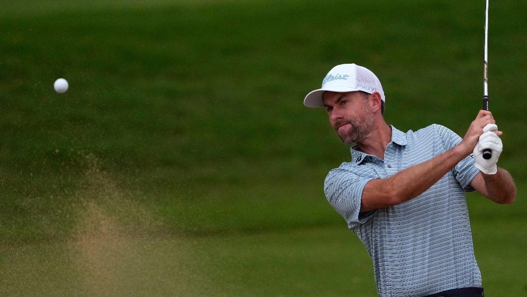 Webb Simpson hits from the hits from the sixth fairway sand trap during the pro-am round of the Sony Open golf event, Wednesday, Jan. 8, 2025, at Waialae Country Club in Honolulu. (AP Photo/Matt York)