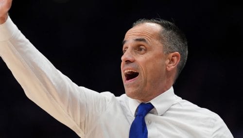 Drake head coach Ben McCollum watches during the first half of an NCAA college basketball game against Kansas State, Tuesday, Dec. 17, 2024, in Kansas City, Mo. (AP Photo/Charlie Riedel)