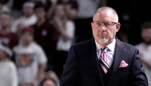 Texas A&M head coach Buzz Williams walks the court before the start of an NCAA college basketball game against Arkansas on Saturday, Feb. 15, 2025, in College Station, Texas. (AP Photo/Sam Craft)