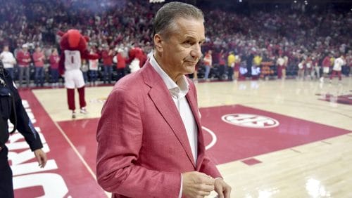 Arkansas coach John Calipari takes the court to play Alabama before an NCAA college basketball game Saturday, Feb. 8, 2025, in Fayetteville, Ark.