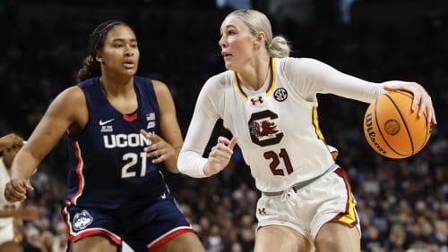 South Carolina forward Chloe Kitts drives against UConn forward Sarah Strong during the first half of an NCAA college basketball game in Columbia, S.C., Sunday, Feb. 16, 2025.