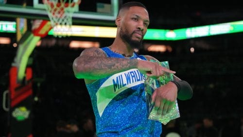 Damian Lillard #0 of the Milwaukee Bucks celebrates with the trophy after winning the Starry 3-Point Contest as a part of State Farm All-Star Saturday Night on Saturday, February 17, 2024 at Lucas Oil Stadium in Indianapolis, Indiana.