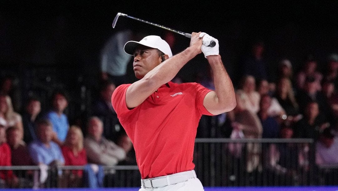 Tiger Woods of the Jupiter Links Golf Club tees off from the 12 hole during a match against the Los Angeles Golf Club, Tuesday, Jan. 14, 2025, in Palm Beach Gardens, Fla.