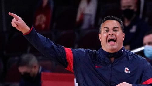 FILE - Arizona head coach Sean Miller instructs from the bench during the first half of an NCAA college basketball game against Southern California on Feb. 20, 2021, in Los Angeles. Miller, former Arizona coach, escaped sanctions on Wednesday, Dec. 14, 2022, when a report from the Independent Accountability Resolution Process largely accepted the program's self-imposed penalties stemming from a NCAA rules violations case that dates back to 2017. (AP Photo/Marcio Jose Sanchez, File)