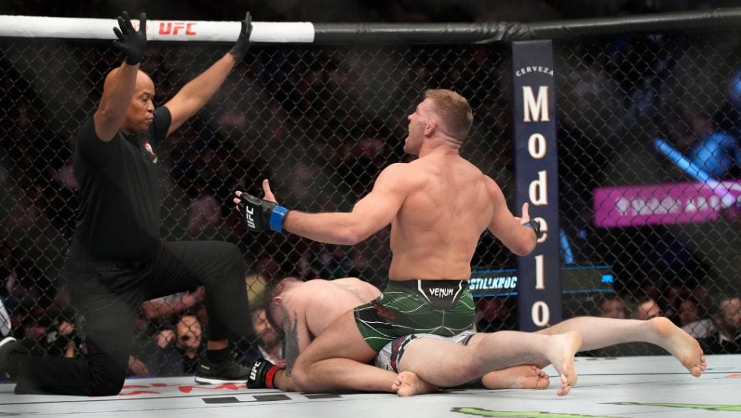 Dricus Du Plessis celebrates after defeating Darren Till during a UFC 282 mixed martial arts middleweight bout Saturday.