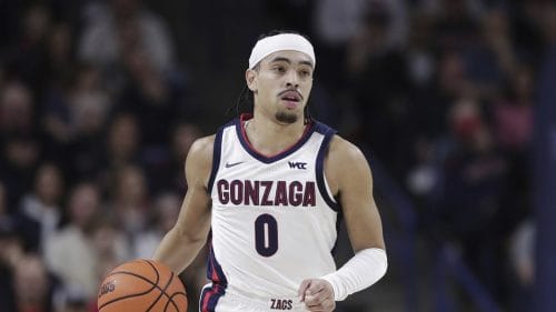 Gonzaga guard Ryan Nembhard (0) controls the ball during the first half of an NCAA college basketball game against Santa Clara, Saturday, Jan. 18, 2025, in Spokane, Wash.