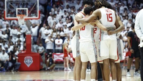 The New Mexico men's basketball team gather for a huddle during the second half of an NCAA college basketball game against UNLV, Saturday, Feb. 10, 2024, in Albuquerque, N.M. UNLV beat New Mexico 80-77.