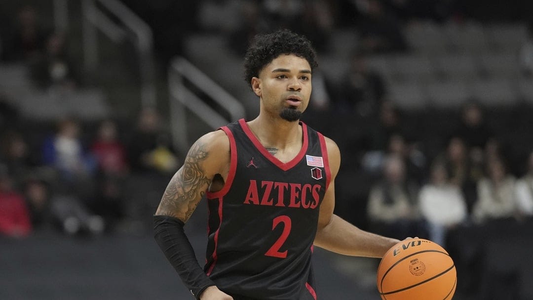 San Diego State guard Nick Boyd (2) during an NCAA college basketball game against California in the San Jose Tip-Off in San Jose, Calif., Saturday, Dec. 21, 2024.