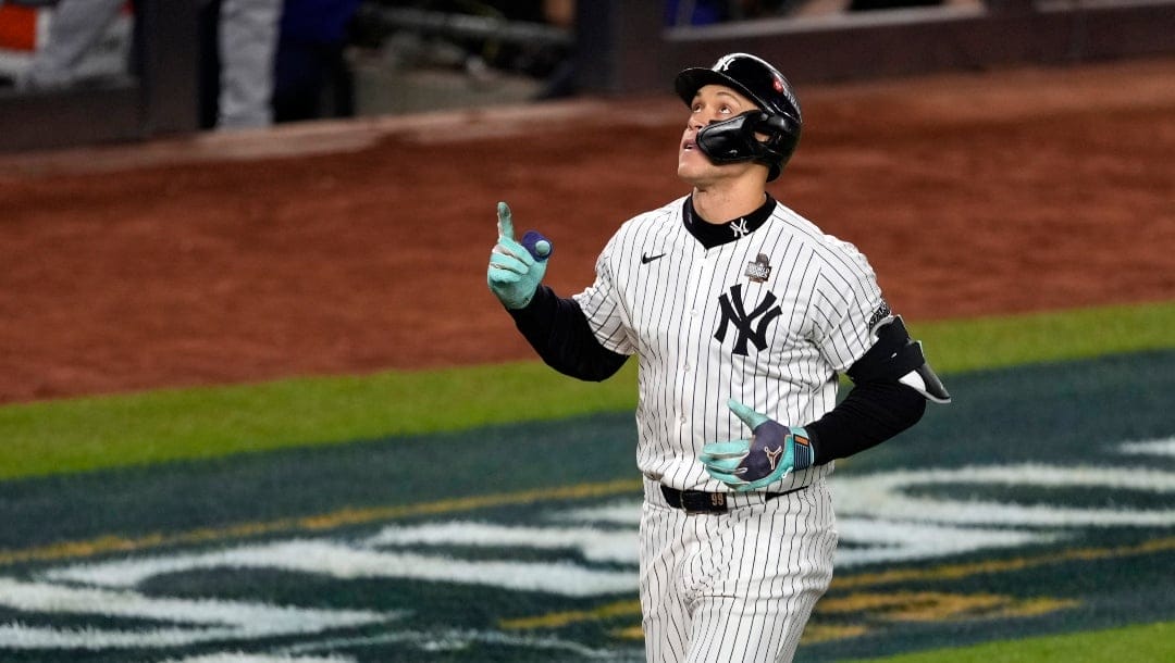 New York Yankees' Aaron Judge celebrates after hitting a two-run home run against the Los Angeles Dodgers during the first inning in Game 5 of the baseball World Series, Wednesday, Oct. 30, 2024, in New York.