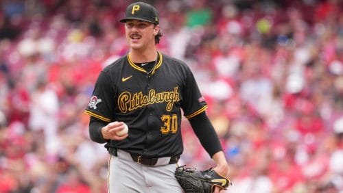 Pittsburgh Pirates' Paul Skenes resets on the mound before delivering a pitch during the fourth inning of a baseball game against the Cincinnati Reds, Sept. 22, 2024, in Cincinnati.