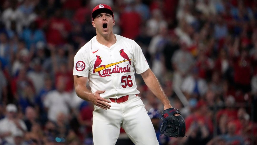 St. Louis Cardinals relief pitcher Ryan Helsley celebrates after striking out Chicago Cubs' Christopher Morel for the final out in the second baseball game of a doubleheader Saturday, July 13, 2024, in St. Louis. The Cardinals won, 5-4.