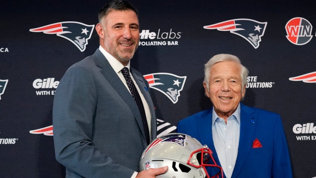 New England Patriots head coach Mike Vrabel smiles while posing with team owner Robert Kraft, right, during an availability, Monday, Jan. 13, 2025, in Foxborough, Mass..