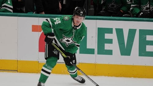 Dallas Stars' Mikael Granlund handles the puck during an NHL hockey game against the Calgary Flames in Dallas, Thursday, March 6, 2025.