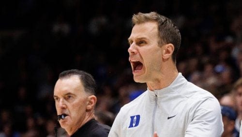 Duke head coach Jon Scheyer, center, reacts after a play during the first half of an NCAA college basketball game against Wake Forest in Durham, N.C., Monday, March 3, 2025. (AP Photo/Ben McKeown)