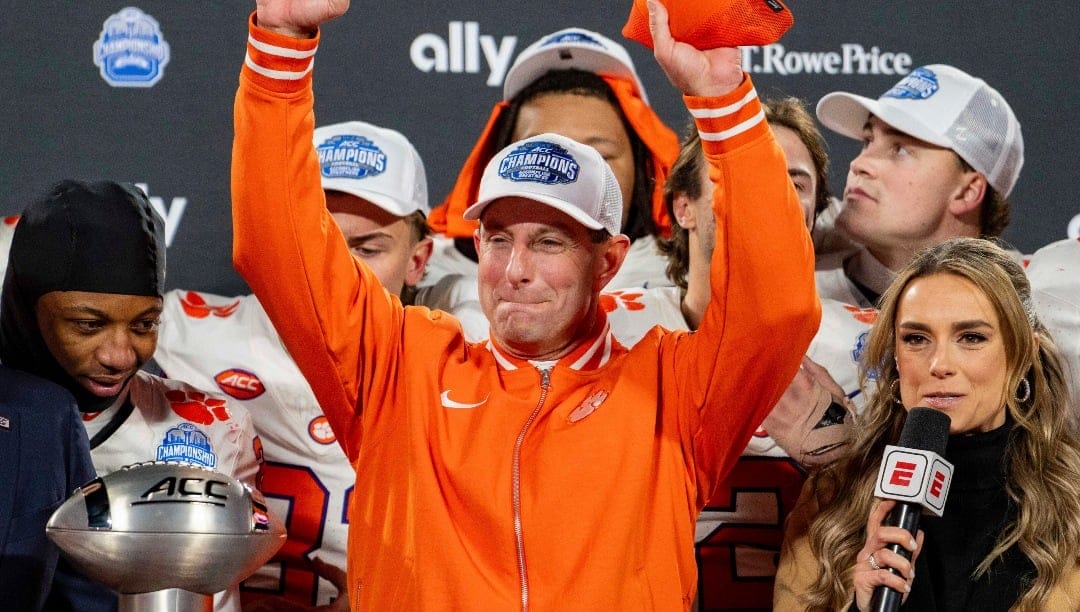 Clemson head coach Dabo Swinney looks on after winning the Atlantic Coast Conference championship NCAA college football game between Clemson and SMU Saturday, Dec. 7, 2024, in Charlotte, N.C. (AP Photo/Jacob Kupferman)