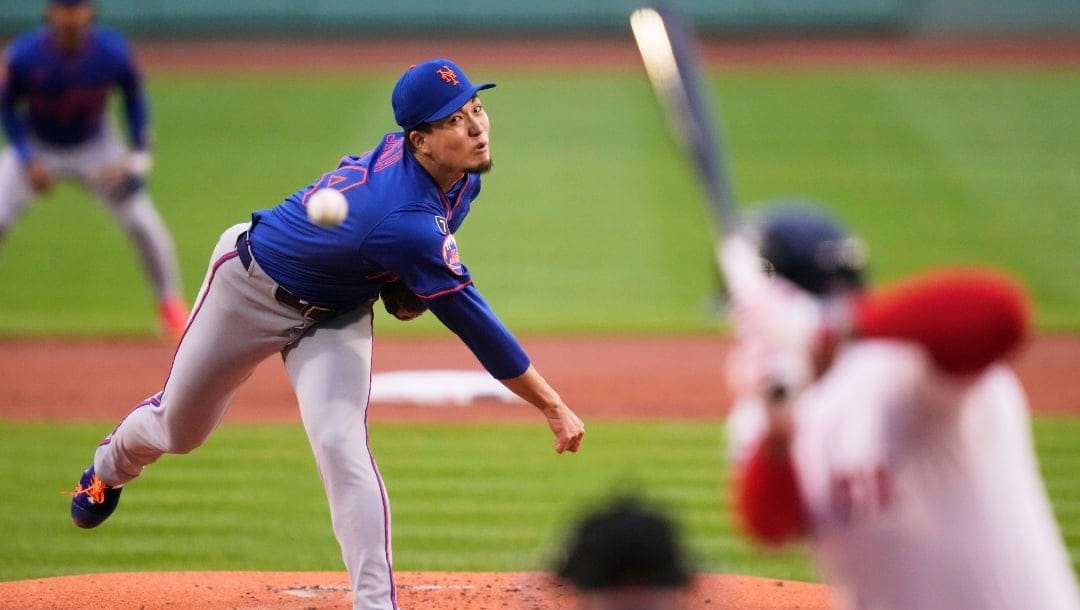 New York Mets pitcher Kodai Senga delivers against the Boston Red Sox during the first inning of a baseball game at Fenway Park, Monday, May 19, 2025, in Boston.