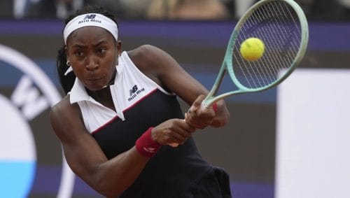 Coco Gauff of the United States, returns to Jasmine Paolini of Italy during their final tennis match in the Italian Open at the Foro Italico in Rome, Saturday, May 17, 2025.
