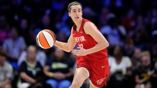Indiana Fever's Caitlin Clark prepares to make a pass during a WNBA basketball game against the Dallas Wings Sunday, Sept. 1, 2024, in Arlington, Texas.