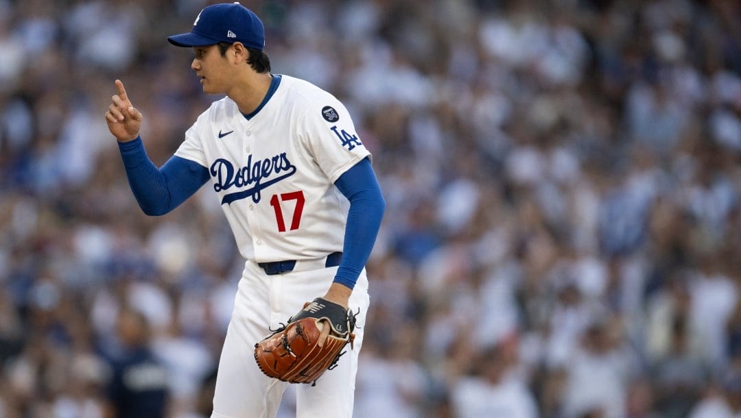 Los Angeles Dodgers starting pitcher Shohei Ohtani gestures before a baseball game against the San Diego Padres, in Los Angeles, Monday, June 16, 2025.