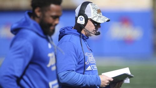 Tulsa head Philip Montgomery check his notes during their NCAA college football game against Tulane in Tulsa, Okla. on Saturday, Nov. 5, 2022.