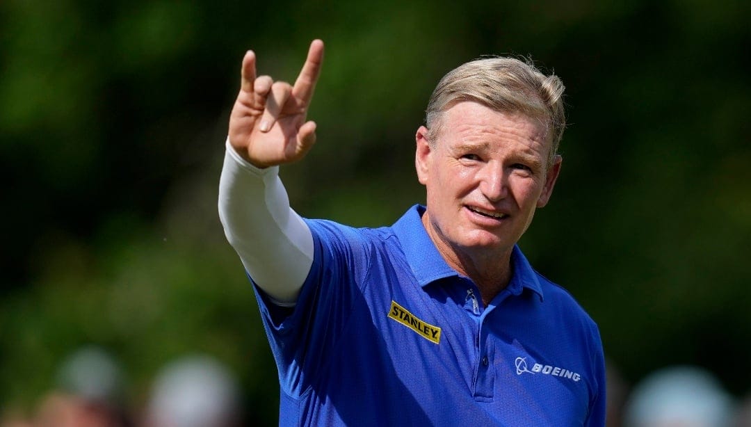 Ernie Els celebrates on the 18th green after winning the Champions Tour Principal Charity Classic golf tournament, Sunday, June 2, 2024, in Des Moines, Iowa. (AP Photo/Charlie Neibergall)