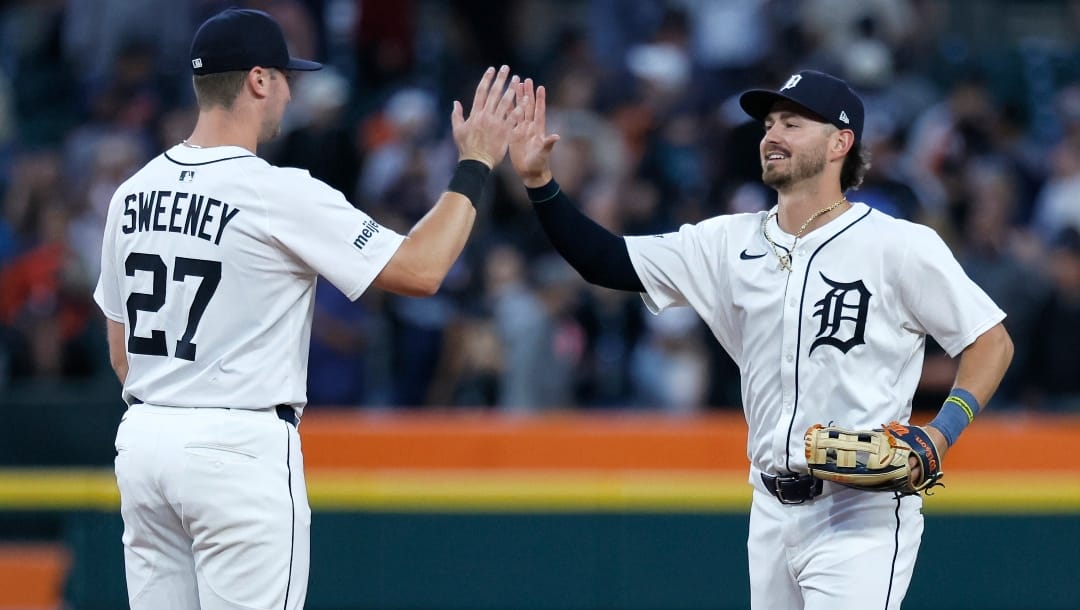 Detroit Tigers' Trey Sweeney, left, celebrates with Zach McKinstry, right, after a win over the Tampa Bay Rays in a baseball game Monday, July 7, 2025, in Detroit.