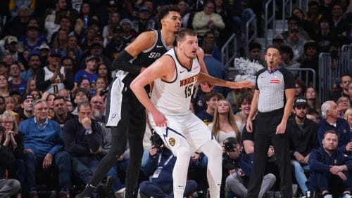 Nikola Jokic #15 of the Denver Nuggets plays defense against Victor Wembanyama #1 of the San Antonio Spurs during the game on January 3, 2025 at Ball Arena in Denver, Colorado.
